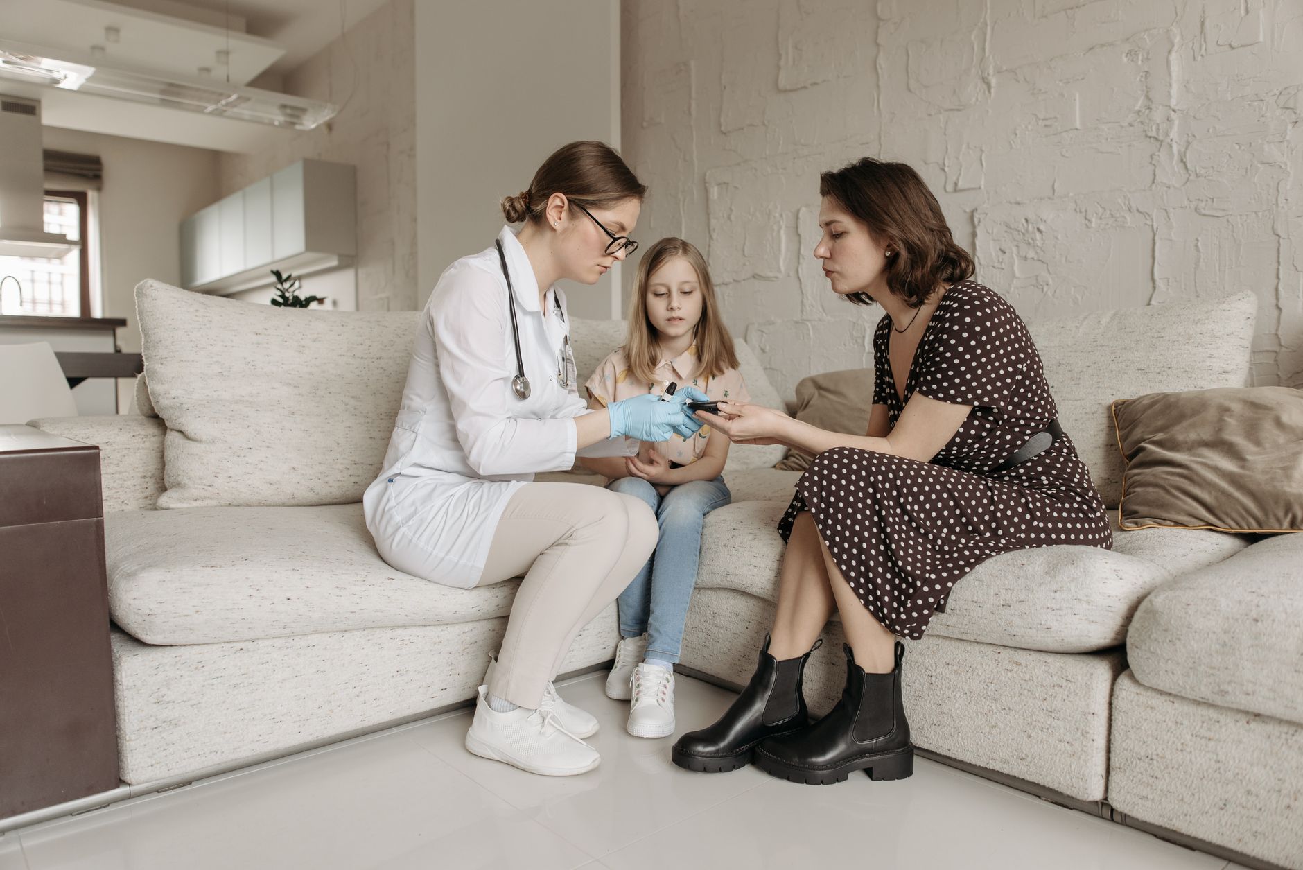 A home health aide assisting an elderly patient in a residential setting