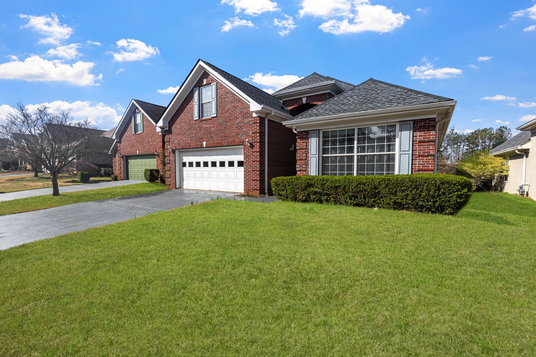 Single-family suburban home representing the residential real estate market